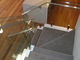 Type en verre moderne supérieur balayé de broche de balustrade de solides solubles 316 de plancher monté